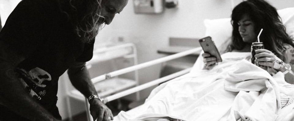 Mom Was Shamed For Staring at Her Phone in Postbirth Photo — Her Snapback Is SO Good