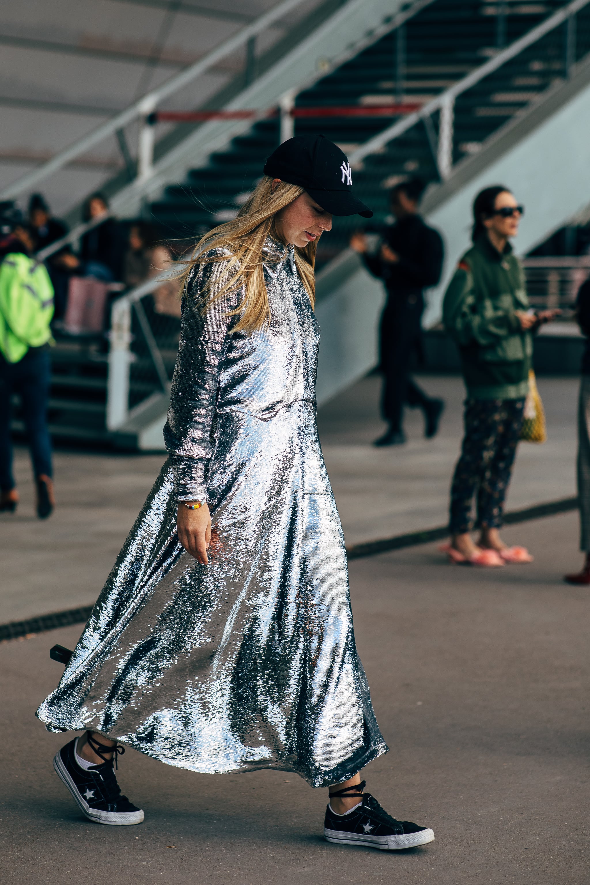 Charlotte Groeneveld wearing silver dress, Louis Vuitton sneakers