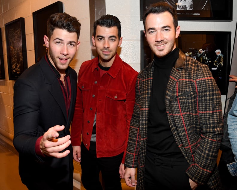 NEW YORK, NEW YORK - DECEMBER 13: Nick Jonas, Joe Jonas, and Kevin Jonas backstage at iHeartRadio's Z100 Jingle Ball 2019 Presented By Capital One on December 13, 2019 in New York City. (Photo by Kevin Mazur/Getty Images for iHeartMedia)