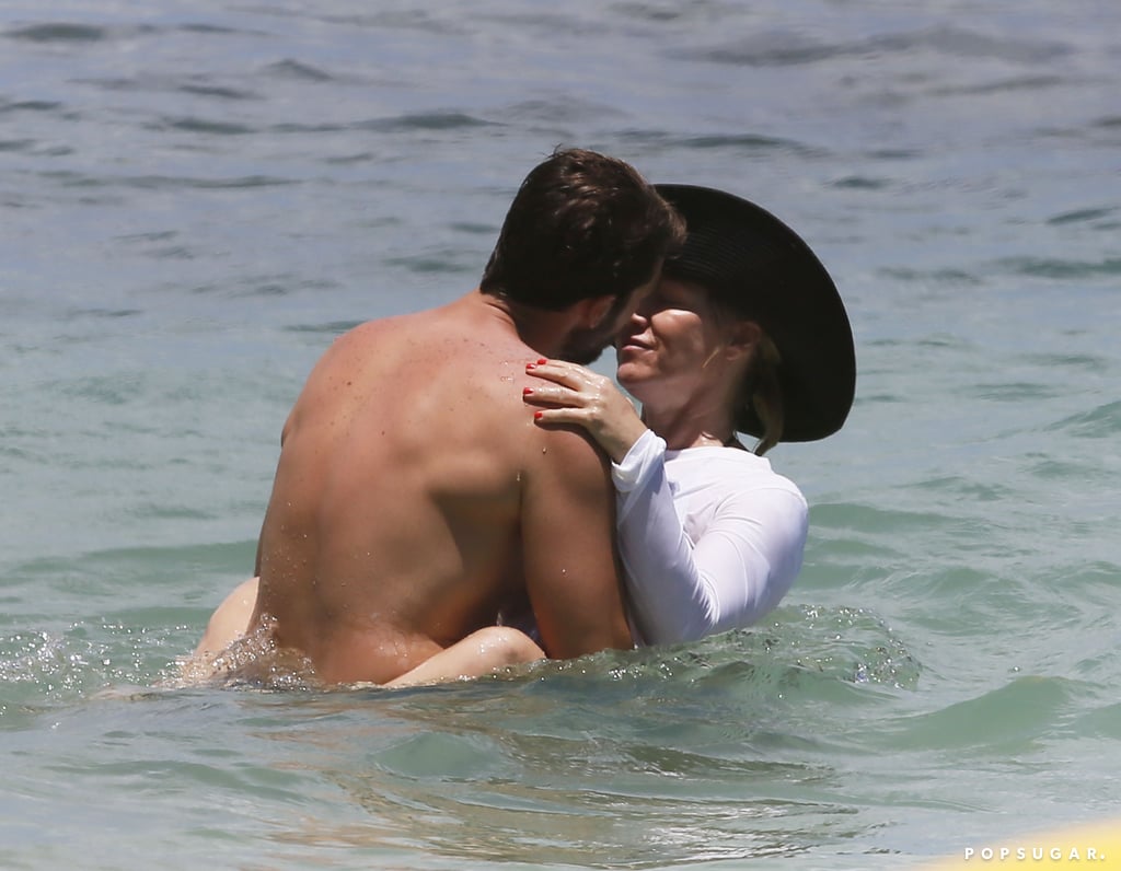 Jennie Garth in a Black Bikini With David Abrams in Hawaii