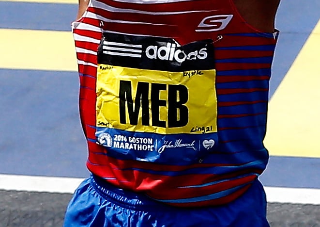 Meb Keflezighi wrote the names of the 2013 Boston Marathon bombing victims on his race bib to carry him through the marathon.