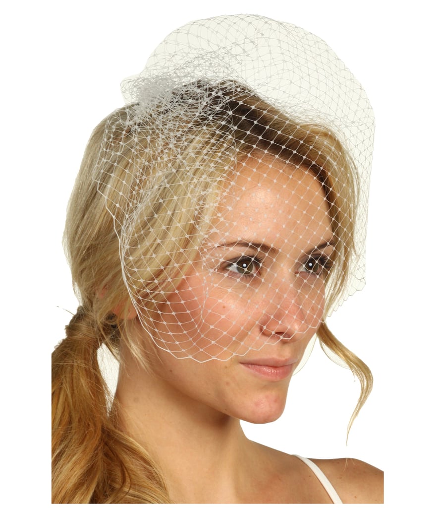 Birdcage veils ($95) are still in if it works for your dress and wedding theme.