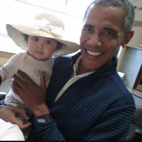 Barack Obama Holding Baby at Anchorage International Airport