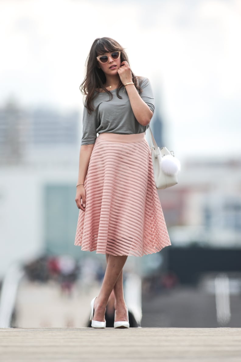 A midi skirt with a tucked-in tee