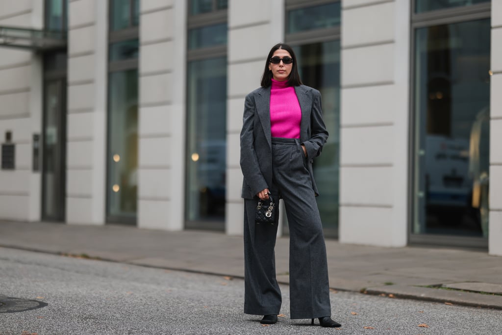 Go ahead and play with color by wearing a bright turtleneck with a neutral suit. Who says winter outfits have to be boring? This one will be sure to cheer you up.