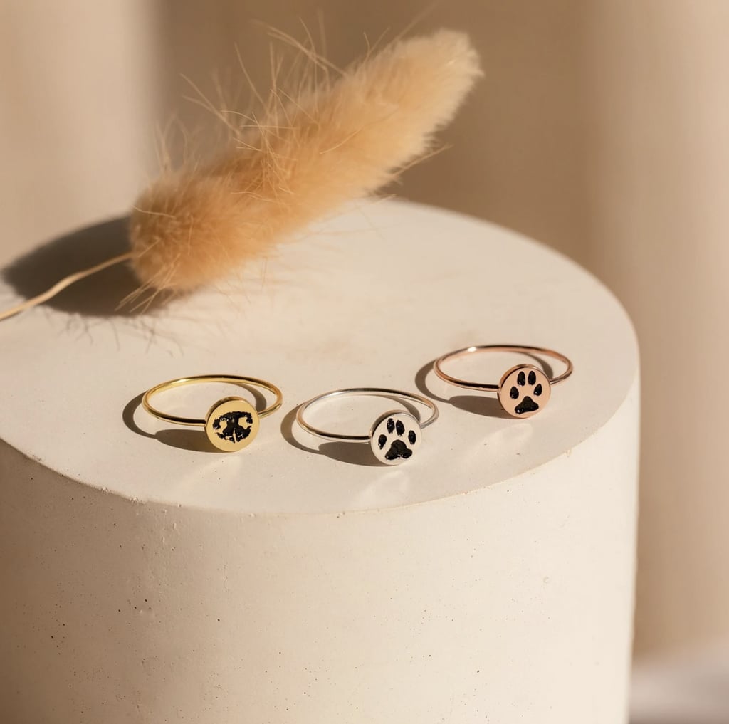 Custom Paw-Print Ring ($29, originally $39) 
For something that's equal parts sentimental and stylish, get them this dainty paw-print ring. The accessory is customizable, so it's easy to make the piece unique. Plus, it's available to shop in several different metals, so you can get the style that's best suited to your recipient.
