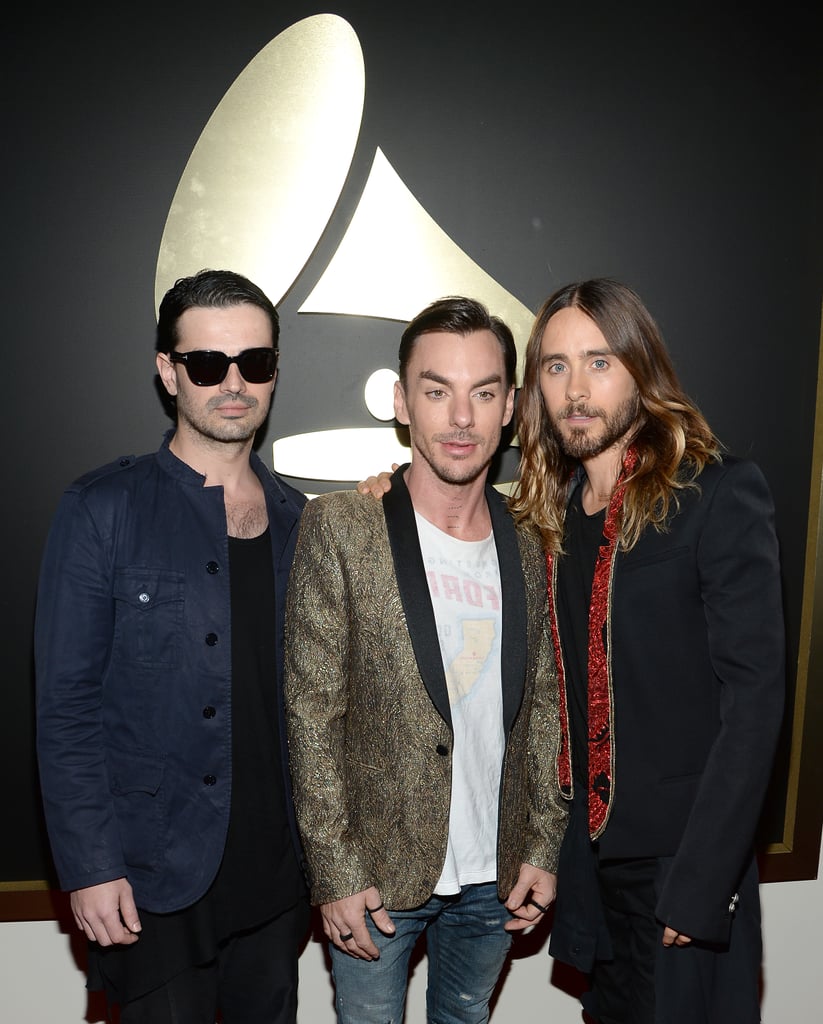 Jared posed with his Thirty Seconds to Mars bandmates: his brother, Shannon, and Tomo Milicevic.