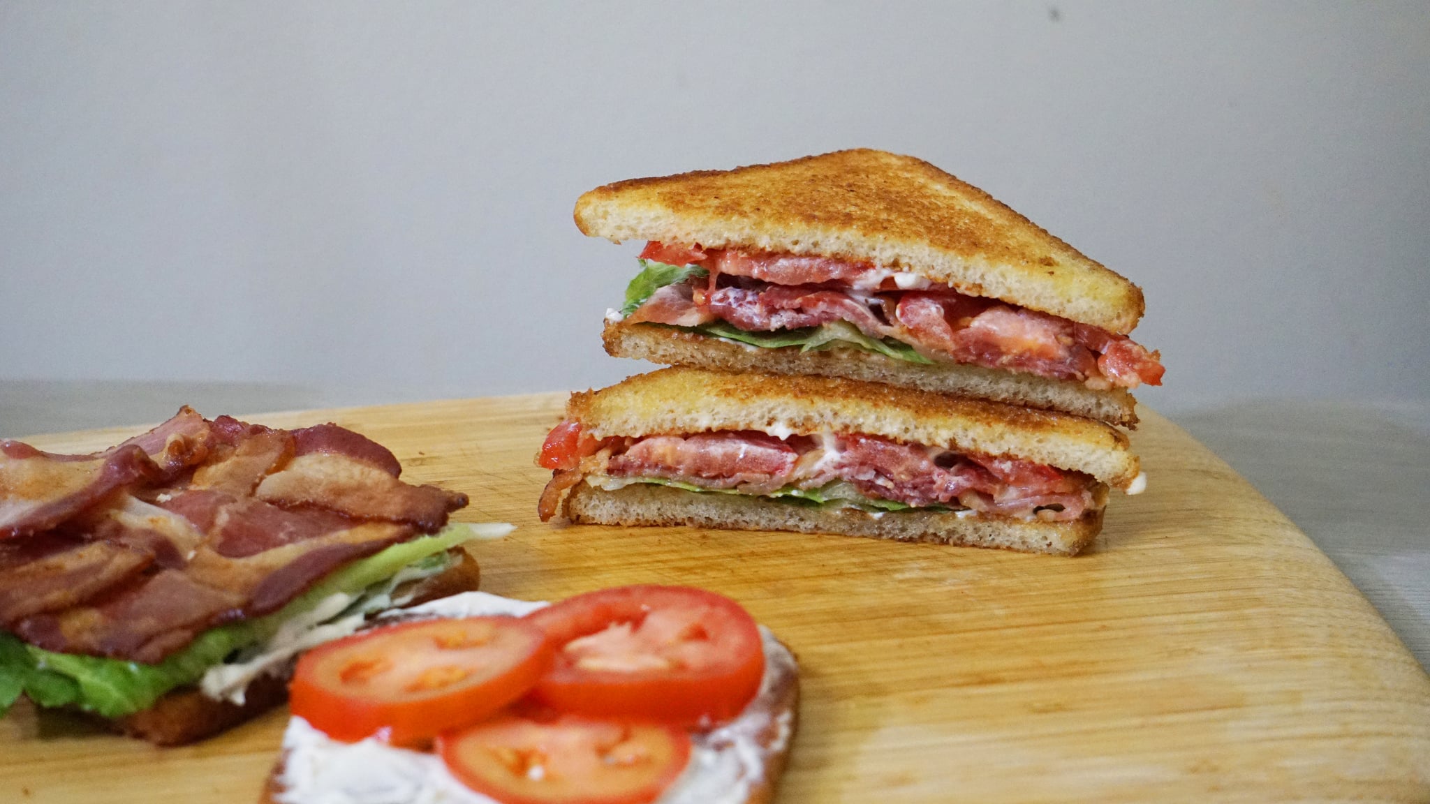 assembling BLT sandwich