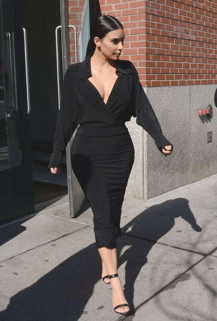 It's all about the right proportions — Kim balanced a cleavage-revealing top with a below-the-knee skirt, keeping everything from looking too sexy.