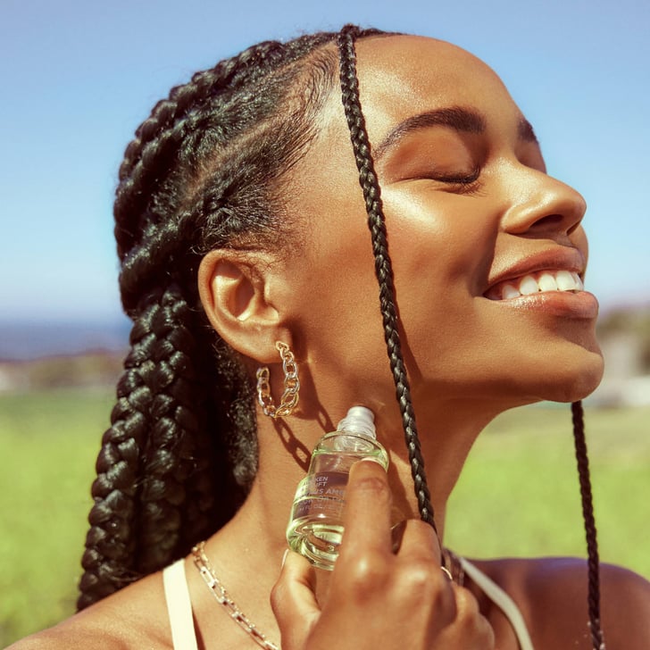 A Perfume Oil Being Frenshe Glow On Perfume Oil in Citrus Amber The