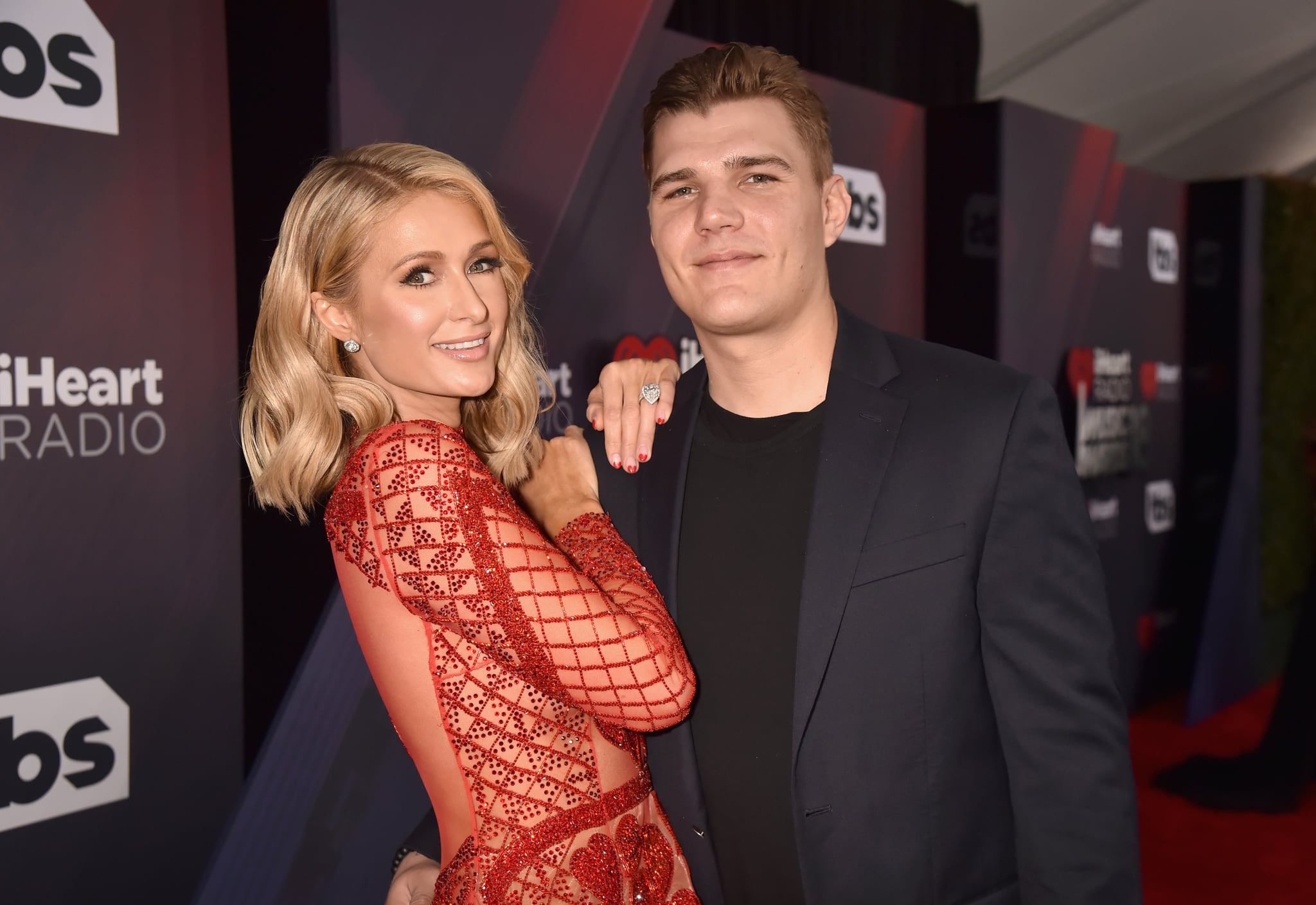 INGLEWOOD, CA - MARCH 11:  Paris Hilton and Chris Zylka arrives at the 2018 iHeartRadio Music Awards which broadcasted live on TBS, TNT, and truTV at The Forum on March 11, 2018 in Inglewood, California.  (Photo by Jeff Kravitz/Getty Images for iHeartMedia)