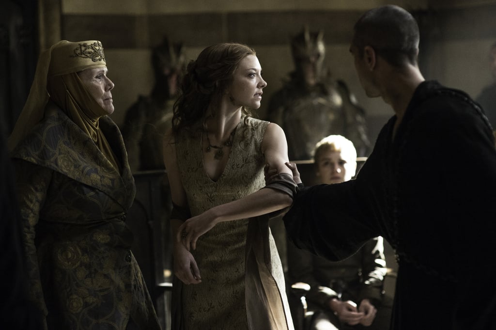 POPSUGAR: Let's talk about Game of Thrones.

Natalie Dormer: Sure, I'm fine with telling you nothing.

PS: Well, great. So, they released a poster, and Jon Snow is obviously on it. What do you make of that?

ND: He got stabbed an awful lot. He's dead. When everyone was asking that we're like, "he's dead." When you get stabbed that many times, you die.

PS: So, what do you think the poster means?

ND: Well, it's great. For the last two years, I haven't read other people's storylines. I love watching the show and the fans. I just sit down on my couch when the new season airs, and the [hums GOT opening theme]. I get excited as well. It helps with me not giving spoilers away. But after all these years, I was like, "I want to start watching it as a fan again." There's so many of our cast, there's so many storylines going off on tangents, you can read just your part of the script, and not have a clue what's going on North of the Wall or down in Dorne or what Dany's up to. So that's the choice I made, because I just want to enjoy the show . . . I think some other people have done that this year in the cast. I think other people have not read other people's storylines as well, to just not know. And we sit in the hair and makeup trailer . . . and we theorize about it, speculate about it in the same way. I can't really give you my speculation, because people will — well, A. I'll get in trouble with Dan and David. And B. People might think I actually know something, and I don't know sh*t.

PS: How do you think Margaery has changed? In season five she had worked her way into the family and she was so confident, she felt like she had the upper hand. The floor kind of fell out from underneath her. She and her brother are both in captivity, and they're awaiting trial, and she's been broken in a way.

ND: She has, don't worry, I won't spoil anything, but you're completely right. To remain in King's Landing the length of time she has, and to have gone through this trauma and to be constantly looking over your shoulder like that. And then to have the rug pulled out from under you. She definitely has been traumatized by the experience, there's no two ways about it. Nikolaj Coster-Waldau's arc over the seasons would be a good example of how a character can do a wide . . . That's what's so fantastic about the writing because with television you have a length of time with a character, you can really watch them change and grow or be broken or built back up . . . With Margaery, she's been with me for five years now. It really is nice to have a whole new color and shape to her at this time.

PS: So who do you think she hates more at this point? Cersei or the Sparrows?

ND: You're going to have to wait to find out.