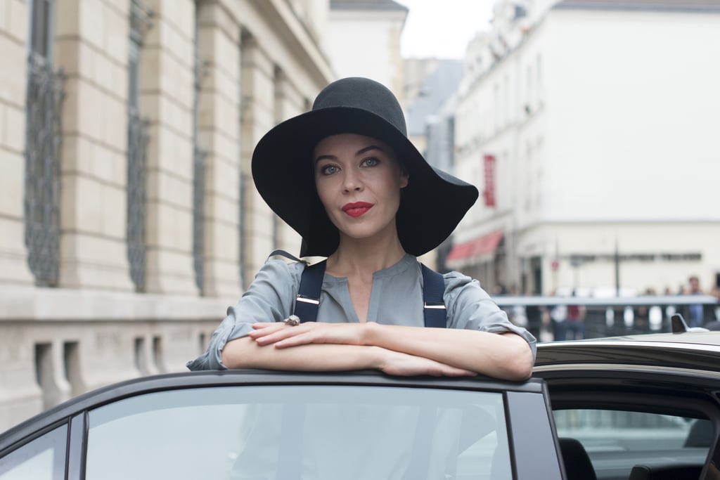 When in doubt, a slicked-back style looks insanely chic under an oversize chapeau.