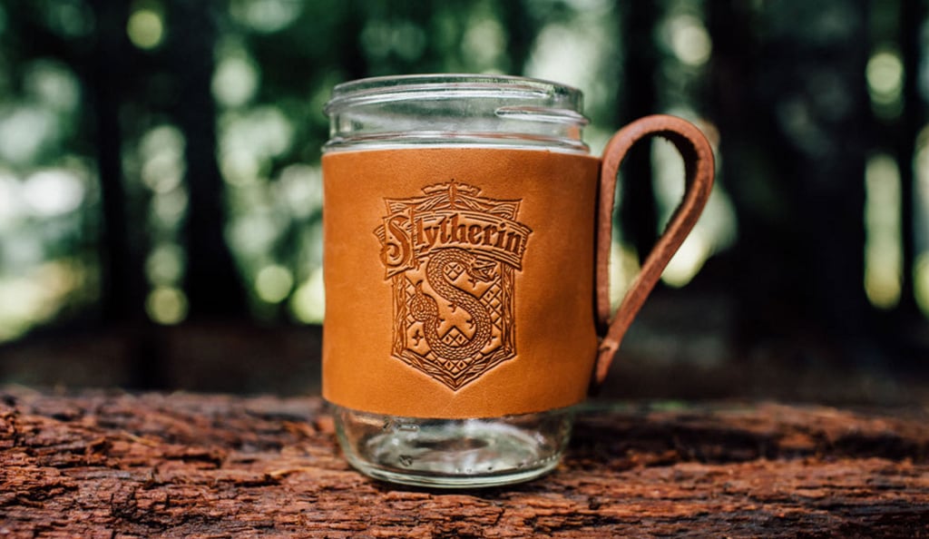 Slytherin Crest Leather Mug Hugger ($10–$12)