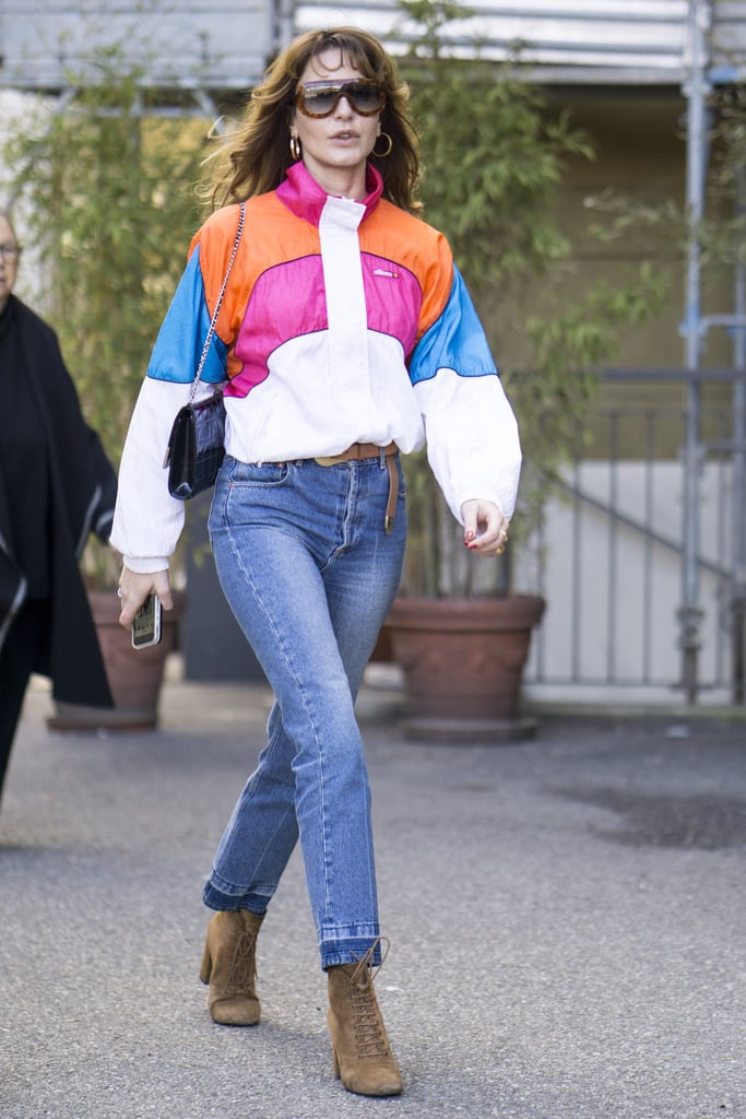 Mix and match your sporty and bohemian pieces by looping a tan belt through your denim.