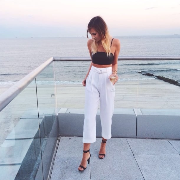 Wow your date with something a little more unexpected — try a crop top and high-waisted pants, then add in your sexiest heels. 
Source: Instagram user weworewhat