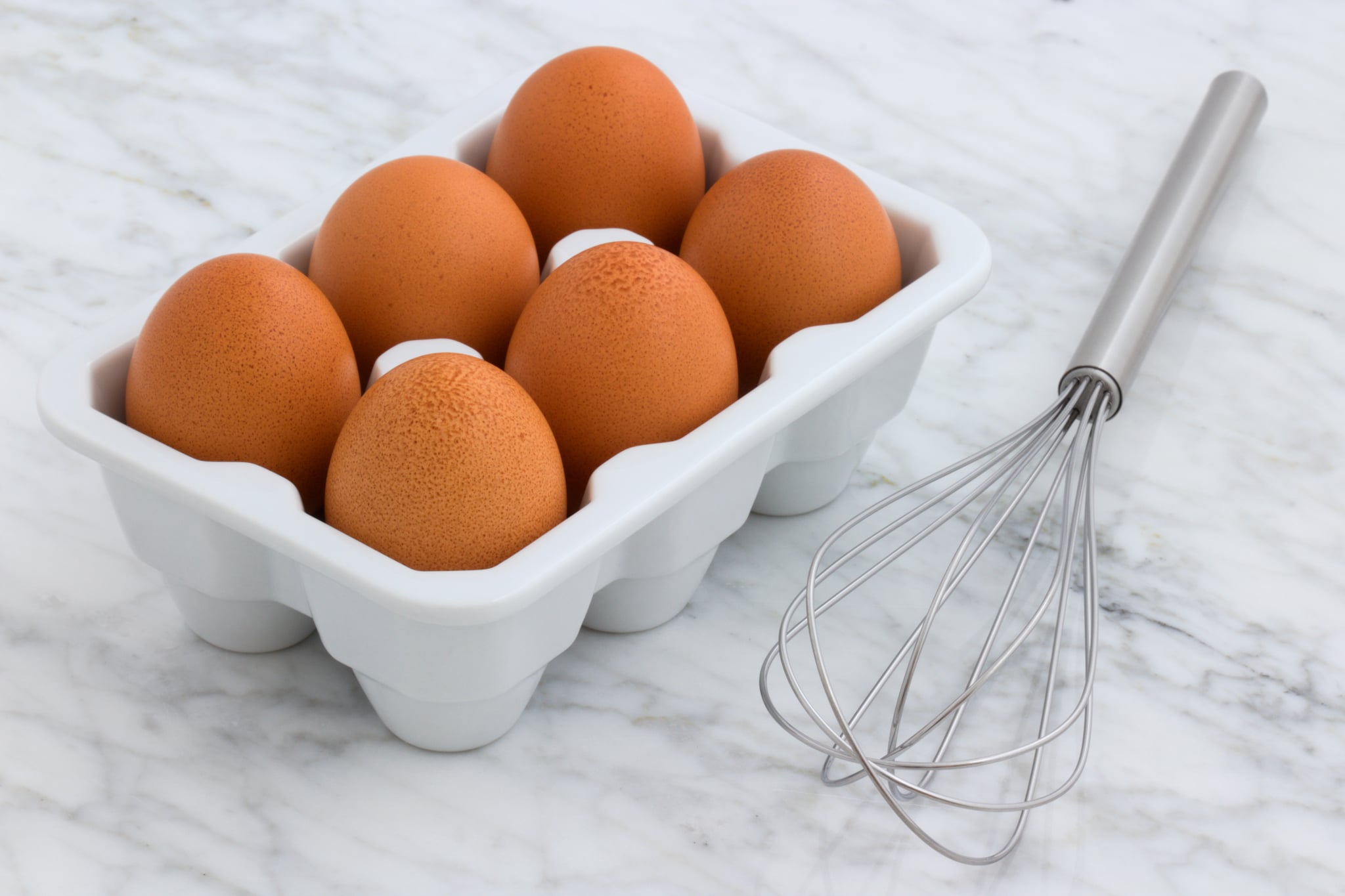 tmp_tjweES_e2e1f5b5f80d4bf5_six-brown-eggs-with-tray-2959303.jpg