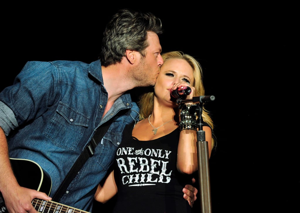February 2012: The country couple took their duets to the next level by performing "America the Beautiful" at Super Bowl XLVI together. Their harmonies were amazing and made country fans everywhere swoon.
April 2013: Rumors that the couple were having issues began to surface, but the "Highway Vagabond" singer shut them down. "Divorce is not an option," Miranda told reporters backstage, via Rolling Stone, at the ACM Awards that year.
April 2014: Miranda talked to People about the couple's normal relationship, saying, "we live in the middle of nowhere and have a totally different life away from work." She revealed that even though they have glamorous careers as a couple, "We do things we sing about in our songs — go four-wheeling, we back-road, we fish, we eat at my mother-in-law's at least twice a week."
October 2014: Rumors were still flying that the couple's relationship was in trouble, so Blake took to Twitter to voice his annoyances with the chatter. "Maybe because the divorce rate is so high the tabloids have just decided to play the odds with me and Miranda. Morons . . . #eatad*ck," he wrote at the time.