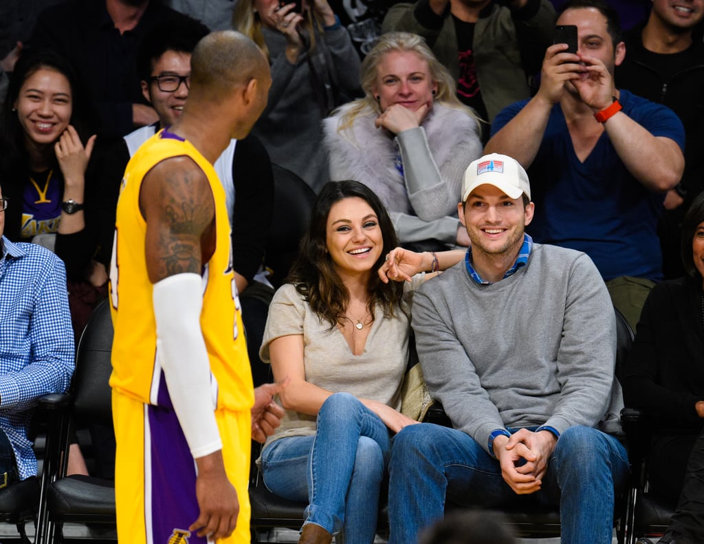 Mila Kunis and Ashton Kutcher at Lakers Game Dec. 2014