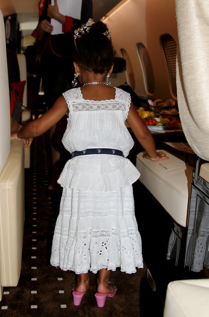 Blue slipped into Beyoncé's heels aboard their flight. 
Source: Beyonce.com