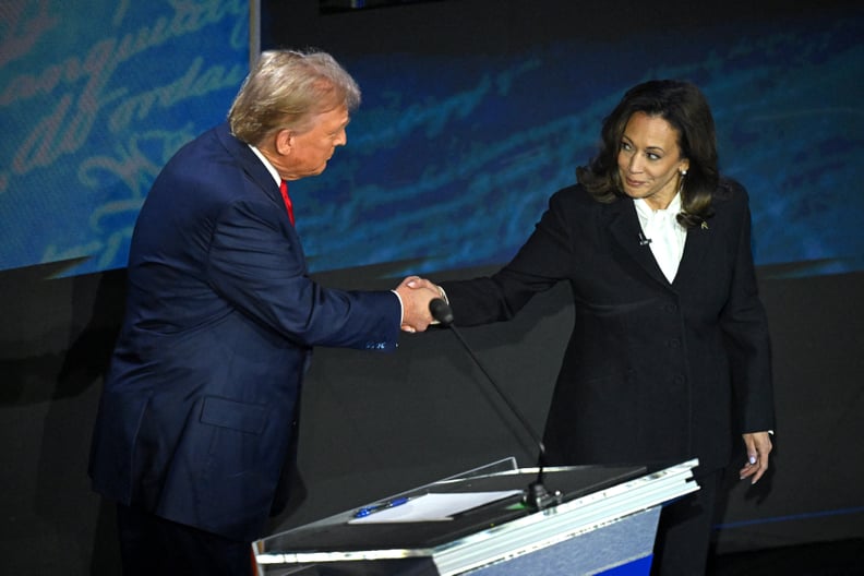 US Vice President and Democratic presidential candidate Kamala Harris shakes hands with former US President and Republican presidential candidate Donald Trump during a presidential debate at the National Constitution Center in Philadelphia, Pennsylvania, 