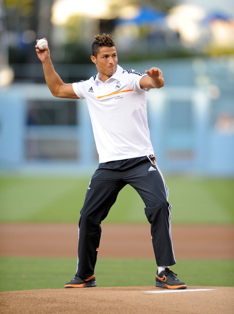 Real Madrid soccer star Cristiano Ronaldo tried his hand at baseball when he threw the first pitch at the LA Dodgers game in July 2013.
