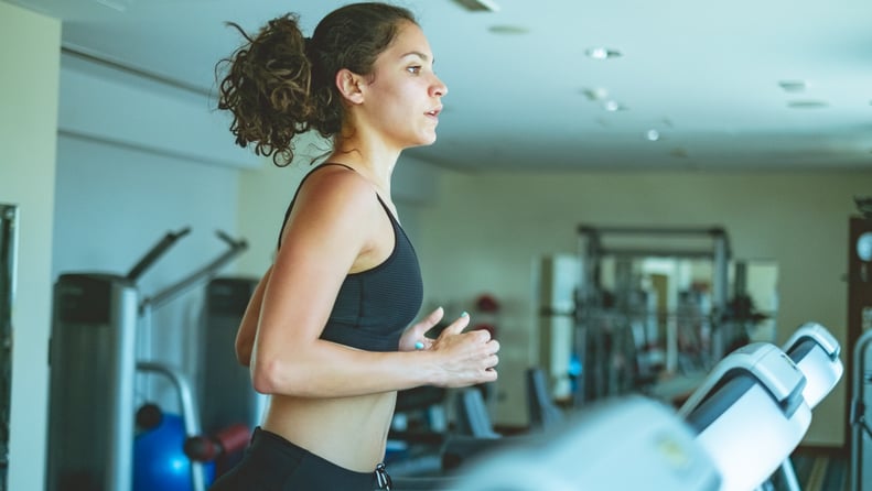 woman in gym doing a beginner treadmill workout