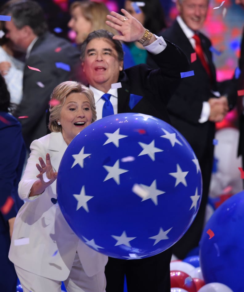 Hillary was having her own fun, having finally upgraded from the small red balloons to the giant printed blue ones.