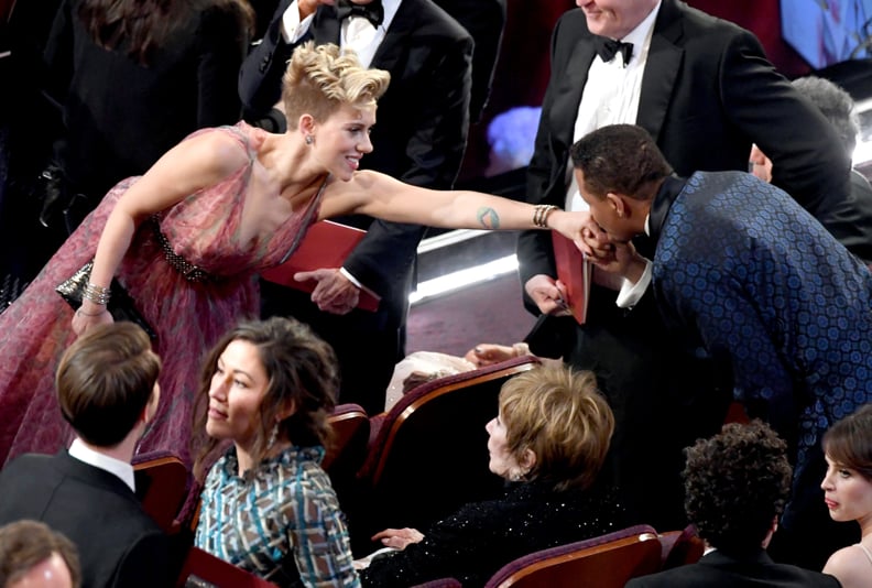 Terrence Howard gave Scarlett Johansson a quick kiss.