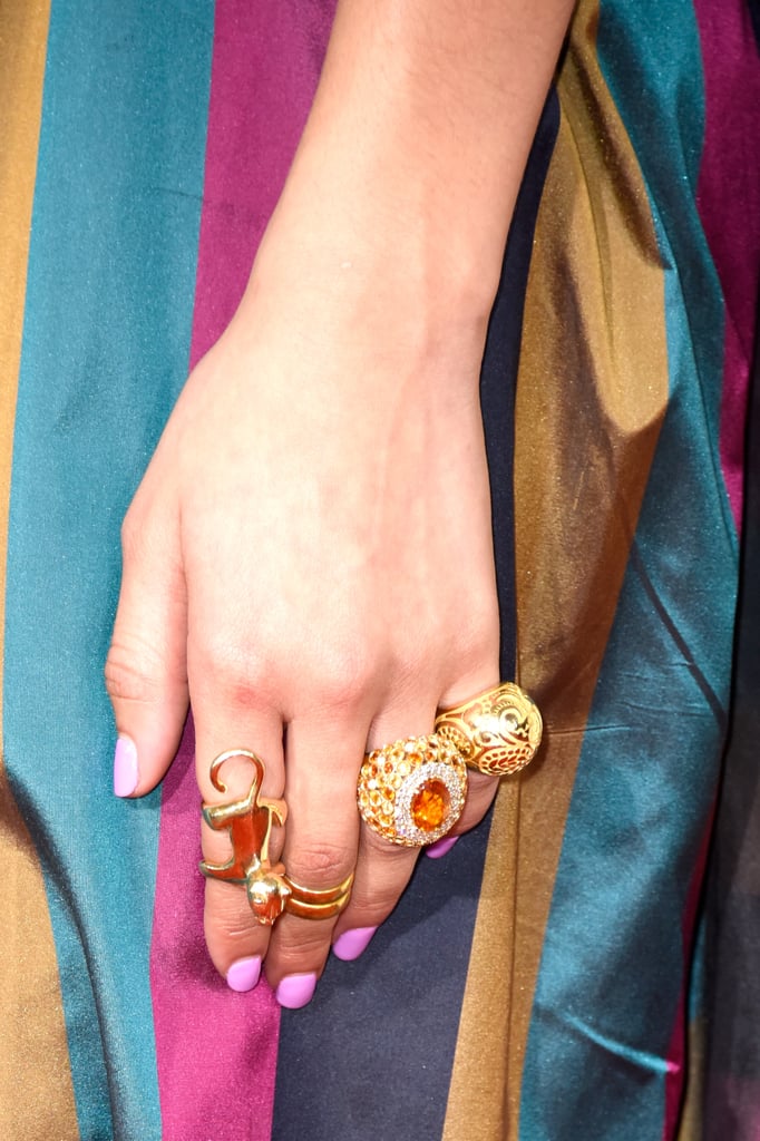 Zendaya's fistful of gold rings managed to catch our eye, despite the bold jewel-toned stripes on her dress. The chunky baubles were by Amrapali, Carrera y Carrera, Leticia Linton, and Jack Vartanian, and we need them all in our jewelry box now.