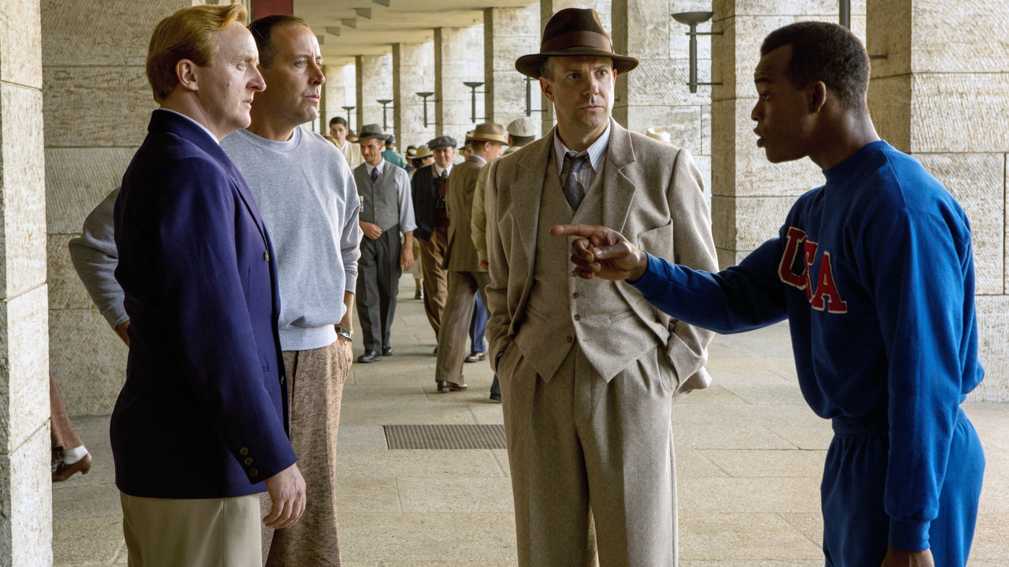 RACE, l-r: Tony Curran, Jonathan Higgins, Jason Sudeikis, Stephan James as Jesse Owens, 2016. ph: Thibault Grabherr/Focus Features/courtesy Everett Collection