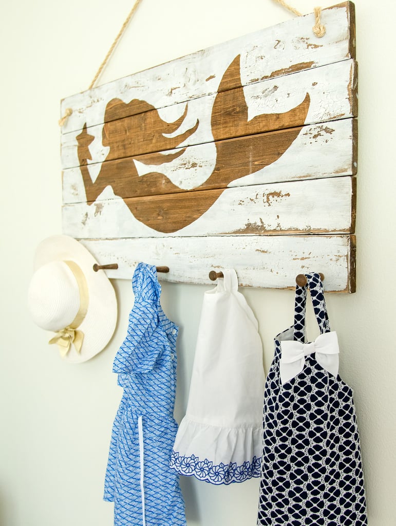 "Because we wanted Vivi's room to grow with her, we stuck to a classic neutral palette, and then added in accessories like the mermaid wall art to give the room a playful feel for her right now," Jessie explains of Vivianne's room.