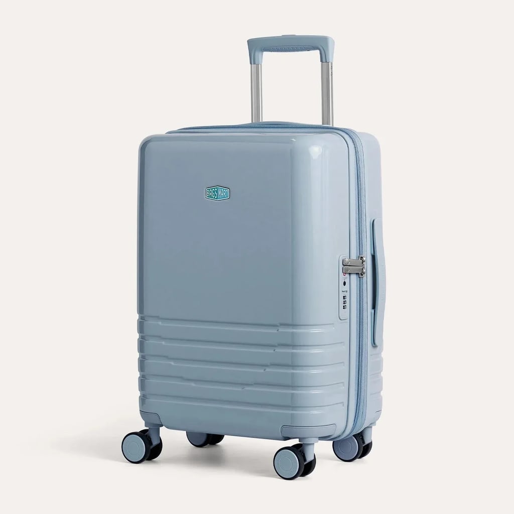Bagsmart Getaway 20" Carry-On ($160)
If there's one item that can really make or break a travel experience, it's your suitcase. That's why investing in a high-quality carry-on is the ultimate travel hack. This Bagsmart design has shock-absorbing wheels for walking on uneven pavement and is expandable in case you need some extra packing room. Plus, with 12 colors to choose from, you can pick the perfect shade to match your aesthetic.