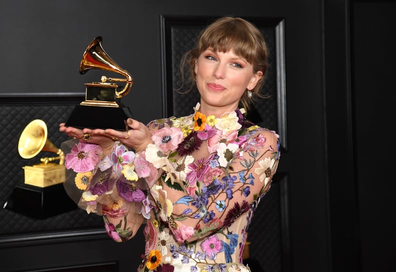 LOS ANGELES, CALIFORNIA - MARCH 14: Taylor Swift, winner of Album of the Year for 'Folklore', poses in the media room during the 63rd Annual GRAMMY Awards at Los Angeles Convention Center on March 14, 2021 in Los Angeles, California. (Photo by Kevin Mazur