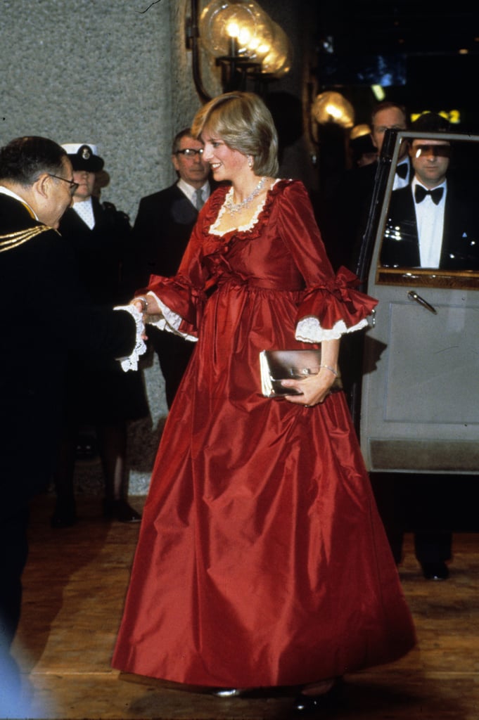 Despite being pregnant with William at the time, Princess Diana wasn't one to shy away from major social events. Here she is at the Barbican Centre in March 1982 dressed in a red maternity gown by David Sassoon.