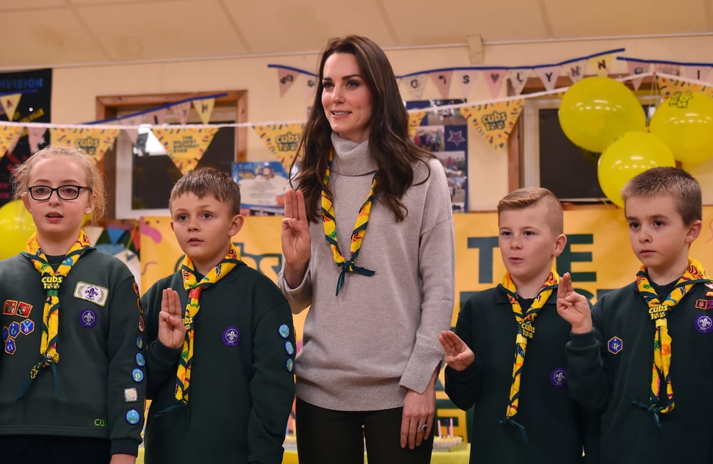 Despite attending fancy events every other night and receiving plenty of lavish gifts, Kate Middleton is one of the most down-to-earth princesses. She jumps at the opportunity to play sports, isn't afraid to pull a funny face during royal outings, and apparently is a big fan of the Cub Scouts. The duchess of Cambridge went on an official visit to a Cub Scout pack meeting in King's Lynn, England, on Wednesday to celebrate 100 years of Cubs. Her simple sweater, olive pants, and brown boots were paired perfectly with one of the Scouts' yellow neckerchiefs, which she wore around her neck throughout the visit. Inside, Kate met with a group of scouts where she learned about their projects and became the demonstration model for how to support a broken arm. If anyone could get us to go camping, it would be Kate.

    Related:

            
            
                                    
                            

            This Photo of the Royals&apos; Wax Figures in Christmas Sweaters Is Here to Slightly Terrify You