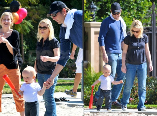 Photos of Amy Poehler, Will Arnett, And Archie Arnett Playing at a LA