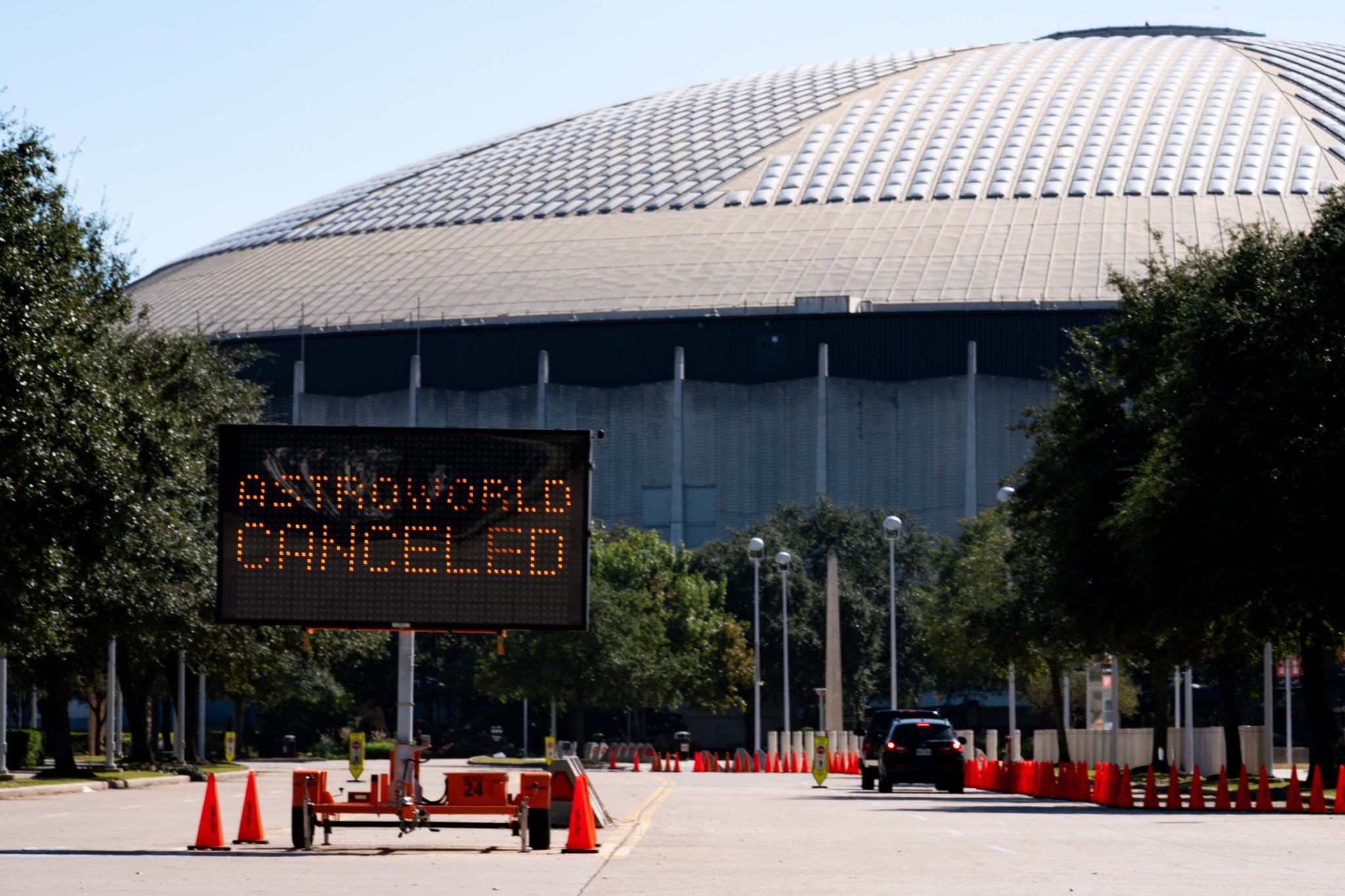 HOUSTON, TX - NOVEMBER 06: A street sign showing the cancellation of the AstroWorld Festival at NRG Park on November 6, 2021 in Houston, Texas. According to authorities, eight people died and 17 people were transported to local hospitals after what they describe as a crowd surge at the Astroworld festival, a music festival started by Houston-native rapper and musician Travis Scott in 2018.  (Photo by Alex Bierens de Haan/Getty Images)