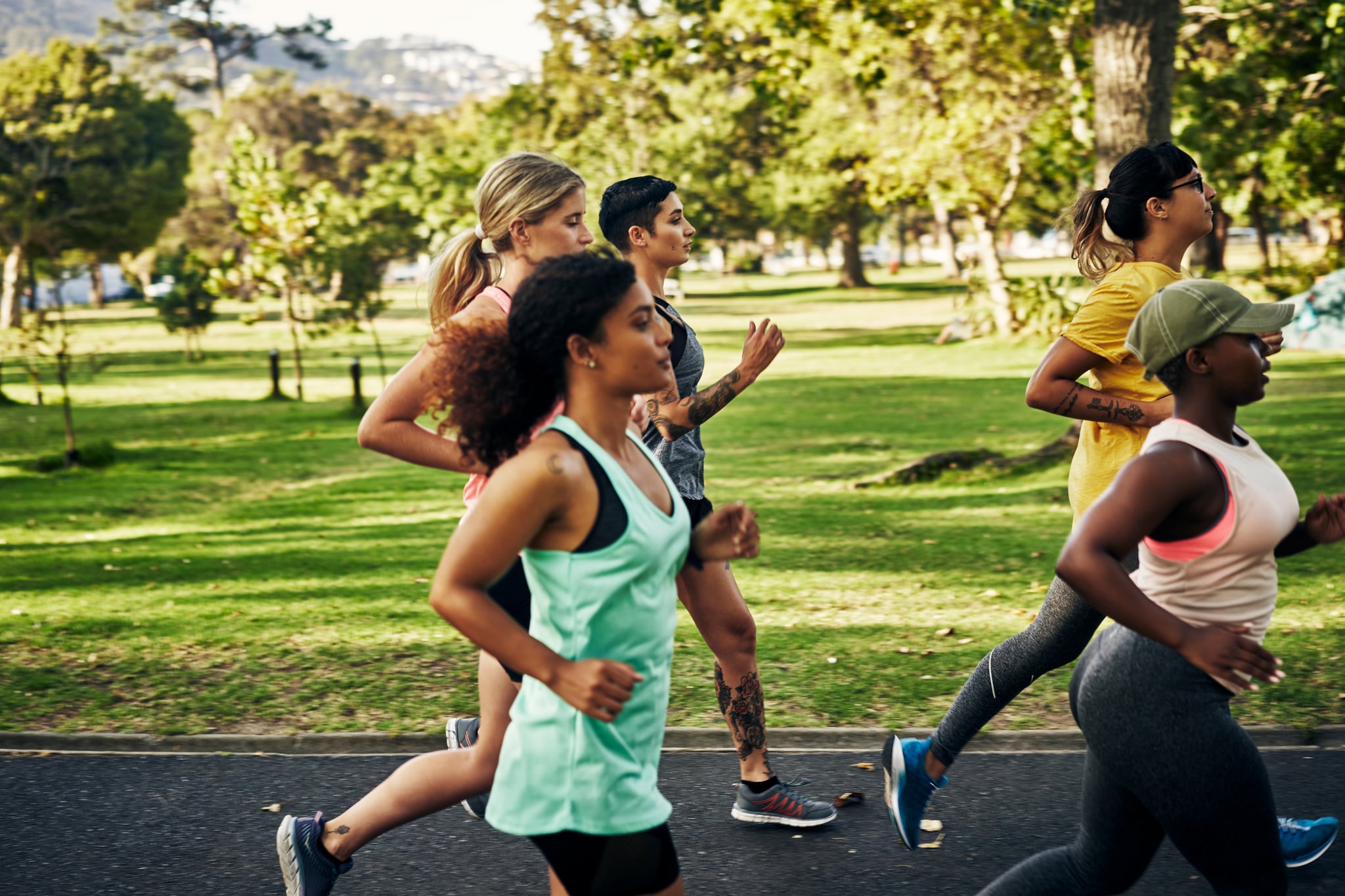 Shot of a group of young women going for a run in the park