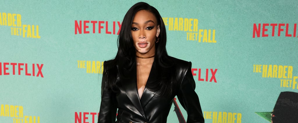 Winnie Harlow Wears a Black Leather Versace Blazer Dress