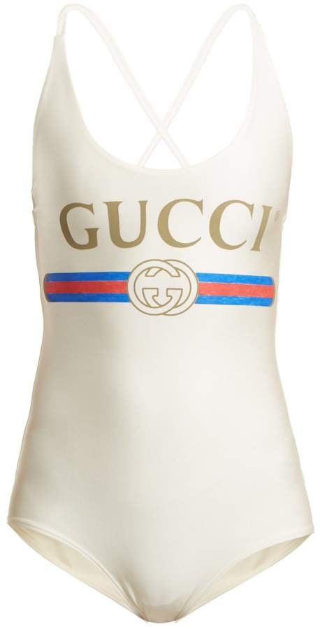 Gucci Logo-Print Bodysuit | Bebe Rexha Wearing a Moschino Swimsuit ...