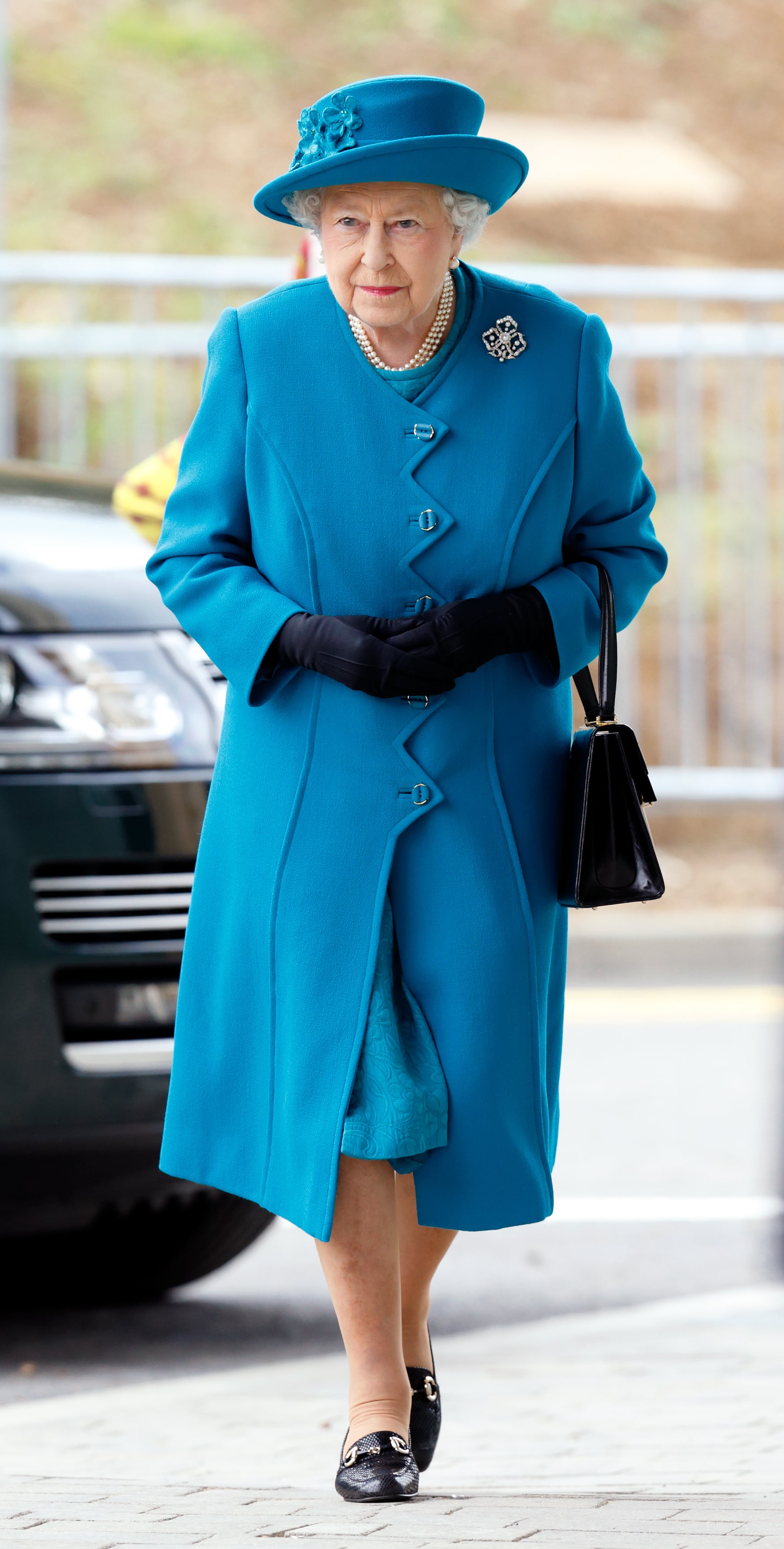 Queen Elizabeth Wearing a Blue Coat and Hat | POPSUGAR Fashion