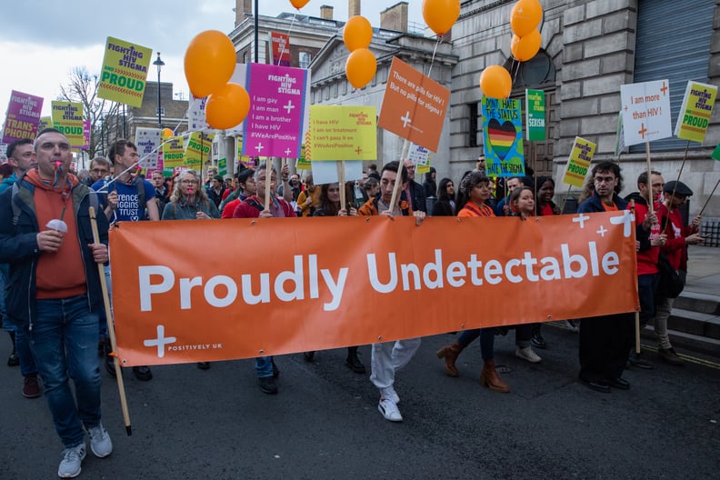 Representatives of Positively UK join over 20 HIV organisations marching along Whitehall to stand up against HIV stigma on 18 March 2023 in London, United Kingdom. HIV and HIV-related stigma disproportionately impact LGBT+ communities. According to the mo