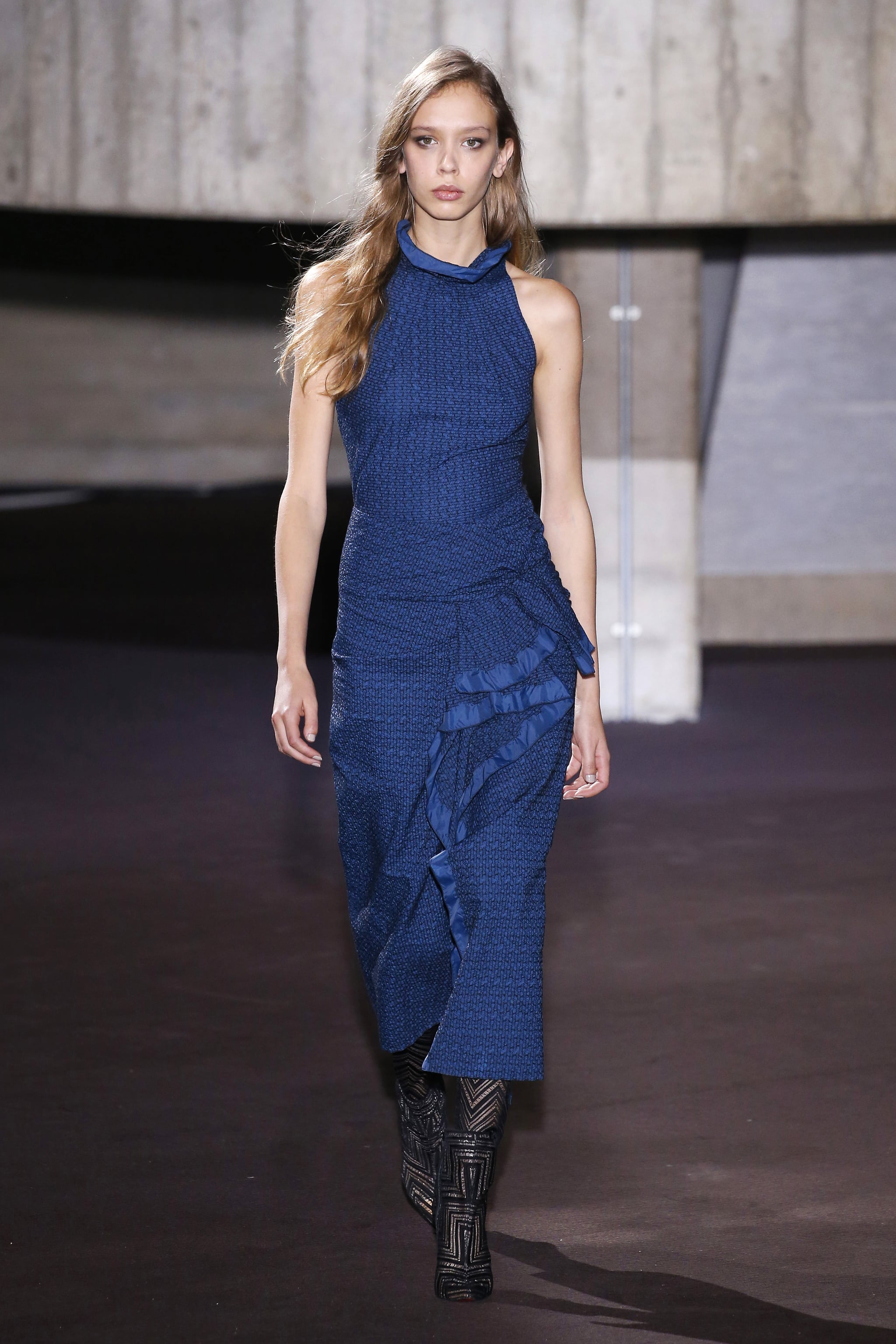 We can totally see Meghan opting for this royal blue dress for her