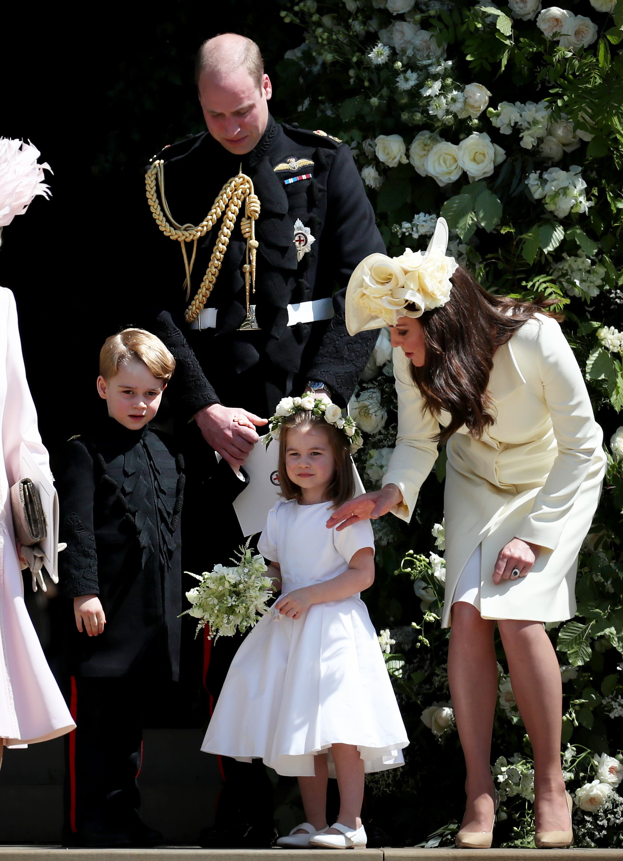 WINDSOR, UNITED KINGDOM - MAY 19:  Prince George of Cambridge, Prince William, Duke of Cambridge, Princess Charlotte of Cambridge and Catherine, Duchess of Cambridge  after the wedding of Prince Harry and Ms. Meghan Markle at St George's Chapel at Windsor Castle on May 19, 2018 in Windsor, England. (Photo by Jane Barlow - WPA Pool/Getty Images)