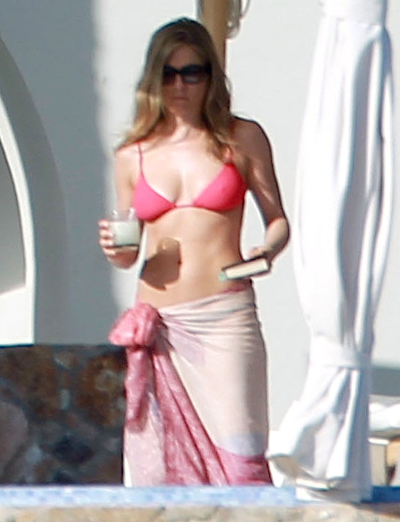 Jennifer sipped on a beverage and read a book while relaxing in Cabo on Christmas Eve in 2012.