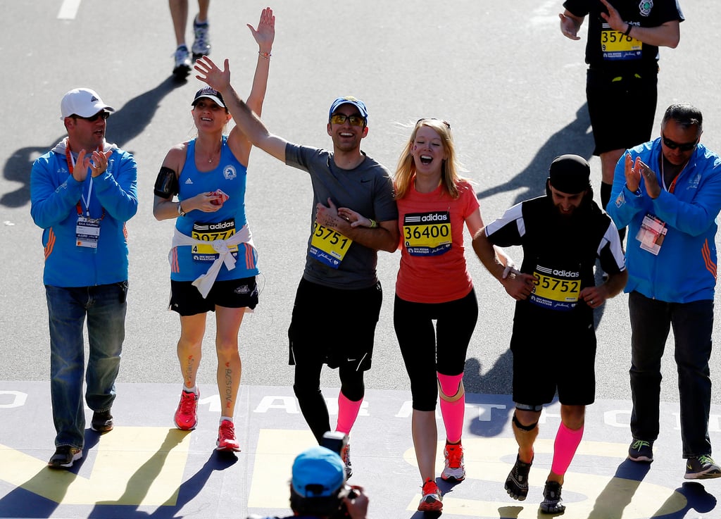Boston Marathon bombing survivor Adrianne Haslet-Davis was all smiles while finishing the race, holding on to her loved ones.