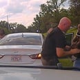 Dashcam Footage of a Cop Saving a Baby's Life Is the Definition of Right Place, Right Time