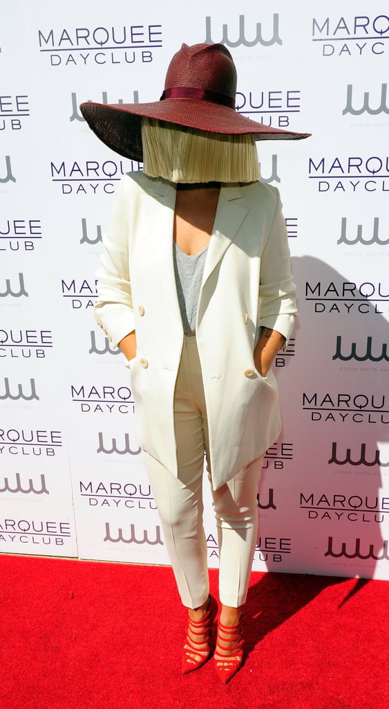Surprise: Sia covered her face at Marquee Dayclub's season preview at The Cosmopolitan in Las Vegas on Saturday.