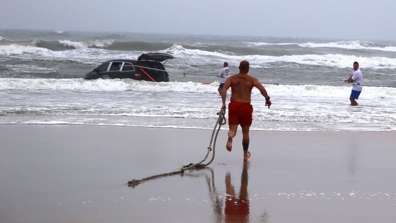 Mom Drives Her Children Into the Ocean